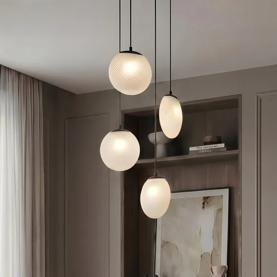 Lámpara colgante Lucande Lunelle, 4 luces, Ø 40 cm, negro y cristal