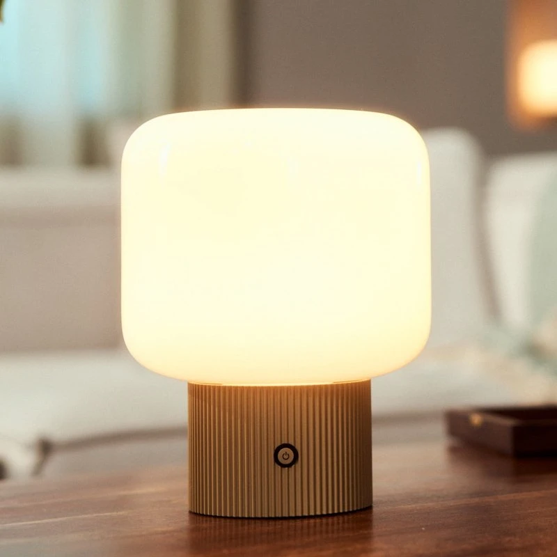 Lámpara de mesa LED recargable Lucande Katrin Palme, beige, cristal