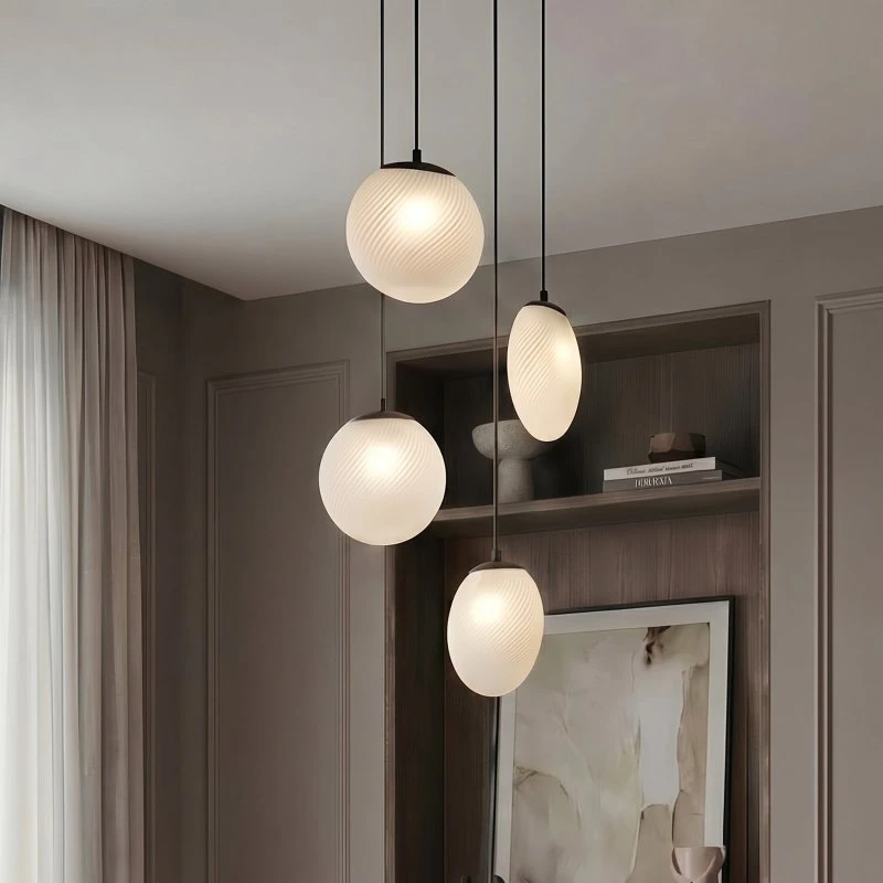 Lámpara colgante Lucande Lunelle, 4 luces, Ø 40 cm, negro y cristal