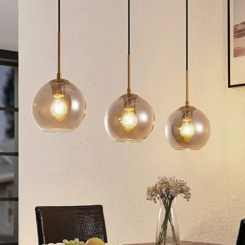Lámpara colgante Lindby Hiwana, gris humo y latón, 3 luces