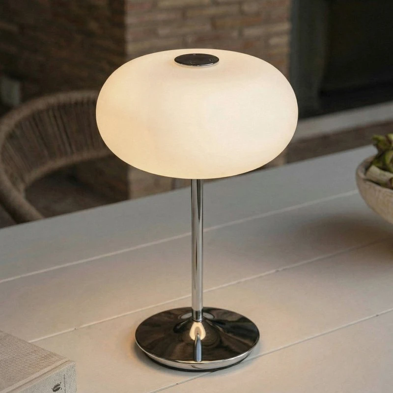 Lámpara de mesa LED recargable Lucande Anoria, cromada y cristal